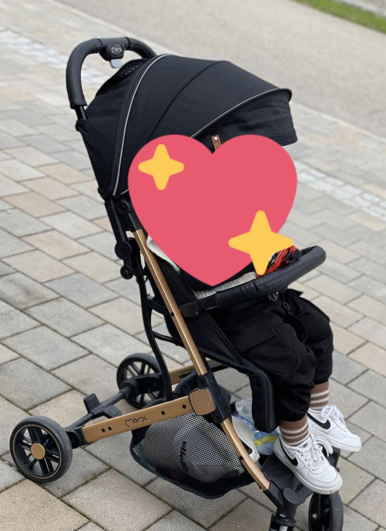 Коляска прогулянкова MoMi Estelle black у реальних умовах використання від користувача Марія.